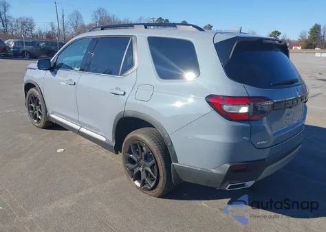 2025 Honda Pilot Touring from USA, damaged, VIN 5FNYG1H77SB149385